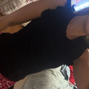 - francesca’s black ruffle top